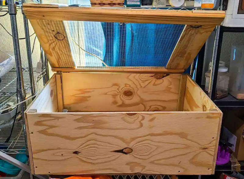 Top 5 Best Quail Brooders for Quail Chicks & DIY Options 8 Wooden quail brooder box with hinged hardware cloth lid