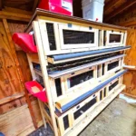 Best Quail Cages: Buy the Right Cage for Your Flock 6 Three-tier wooden quail cage with wire mesh compartments, external feeders, and egg collection trays