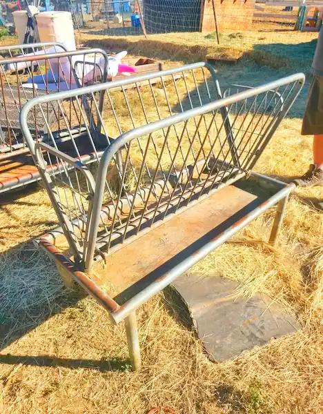 8 Best Goat Feeders: Hay, Grain, Mineral & DIY Options 7 Metal hay rack feeder with slatted sides for goats